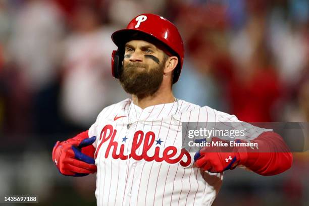 Bryce Harper of the Philadelphia Phillies reacts after his RBI double during the first inning against the San Diego Padres in game four of the...