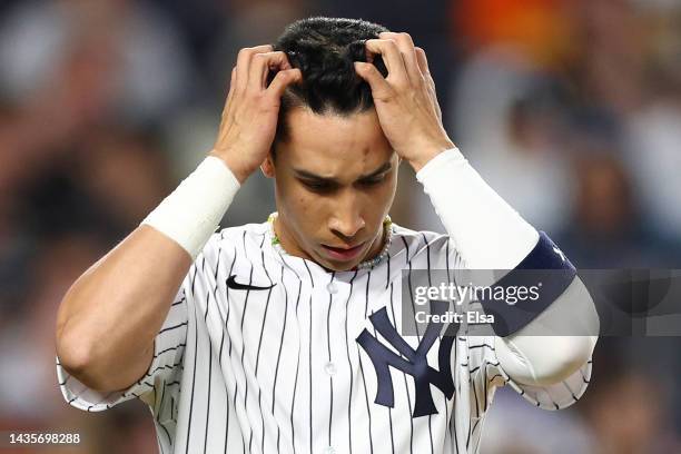 Oswaldo Cabrera of the New York Yankees reacts after striking out against the Houston Astros to end the fifth inning in game three of the American...