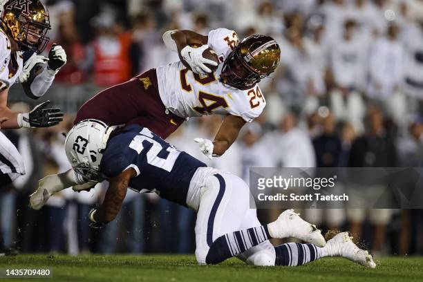 Mohamed Ibrahim of the Minnesota Golden Gophers is tackled by Curtis Jacobs of the Penn State Nittany Lions during the first half at Beaver Stadium...