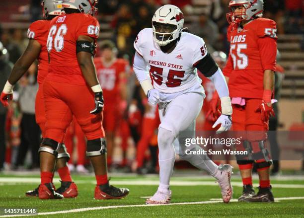 Defensive tackle Leonard Payne Jr. #55 of the Fresno State Bulldogs celebrates after sacking quarterback Justin Holaday of the New Mexico Lobos...