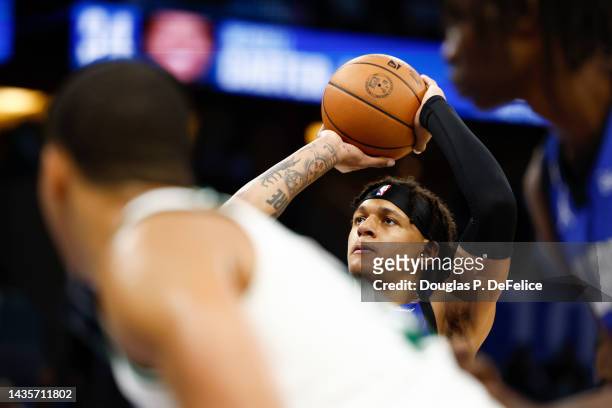 Paolo Banchero of the Orlando Magic shoots a free throw against the Boston Celtics during the fourth quarter at Amway Center on October 22, 2022 in...
