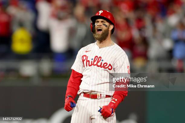 Bryce Harper of the Philadelphia Phillies reacts after his RBI double during the fifth inning against the San Diego Padres in game four of the...