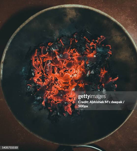 directly above shot of embers in pan on table - grill directly above stock pictures, royalty-free photos & images