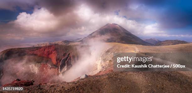 panoramic view of volcanic landscape against sky,tongariro national park,new zealand - active volcano stockfoto's en -beelden