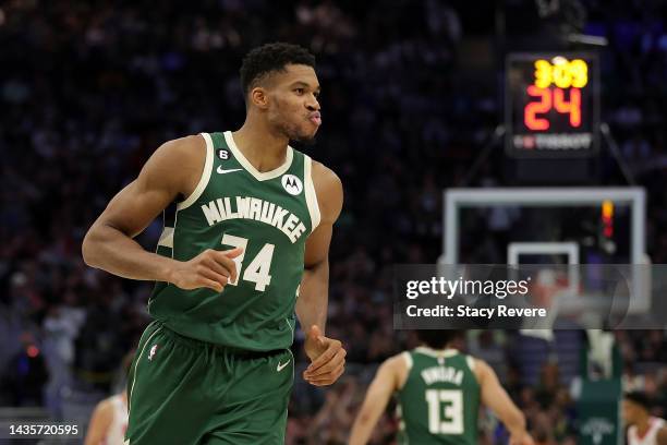 Giannis Antetokounmpo of the Milwaukee Bucks reacts to a three point shot during the second half of a game against the Houston Rockets at Fiserv...