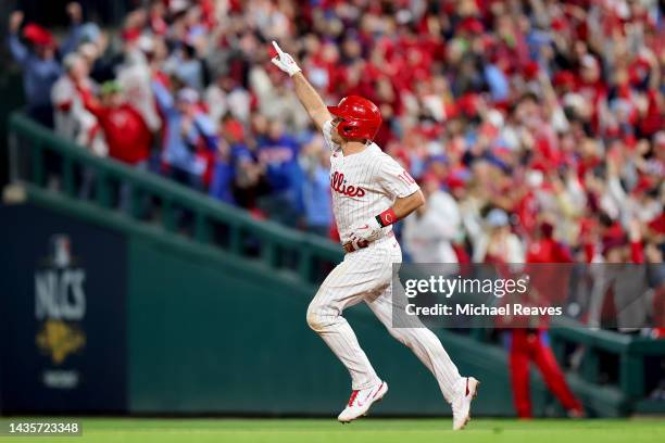 Realmuto of the Philadelphia Phillies reacts after his solo home run during the seventh inning against the San Diego Padres in game four of the...