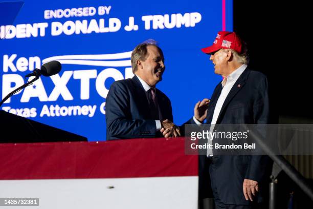 Texas Attorney General Ken Paxton greets former U.S. President Donald Trump at the 'Save America' rally on October 22, 2022 in Robstown, Texas. The...