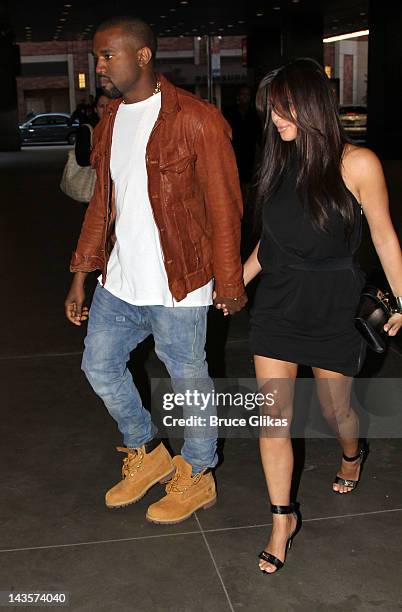 Kanye West and Kim Kardashian visit "Wicked" on Broadway at The Gershwin Theater on April 29, 2012 in New York City.