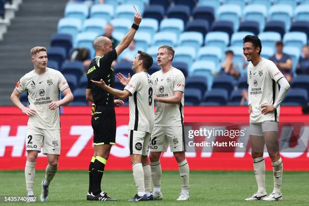 Hiroshi Ibusuki of United is given a red card by referee Daniel Elder during the round three A-League Men's match between Sydney FC and Adelaide...