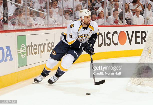 Shea Weber of the Nashville Predators skates behind the net with the puck against the Phoenix Coyotes in Game One of the Western Conference...