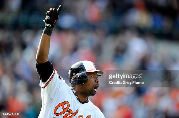Wilson Betemit of the Baltimore Orioles celebrates after hitting the game-winning home run in the ninth inning against the Oakland Athletics at...