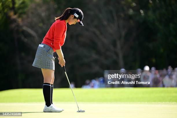 Haruka Kawasaki of Japan holes the birdie putt on the 9th green during the final round of the Nobuta Group Masters GC Ladies at Masters Golf Club on...