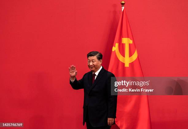 General Secretary and Chinese President Xi Jinping waves as he arrives for a press event with Members of the new Standing Committee of the Political...