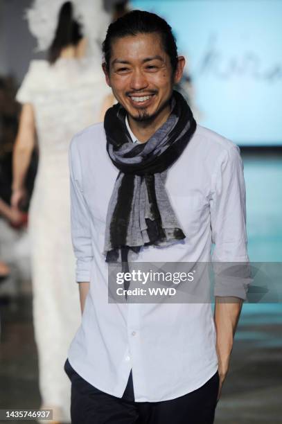 Fashion designer Akira Isogowa on the runway after his Akira presentation at Fashion Palette New York's spring 2013 show at Canoe Studios.