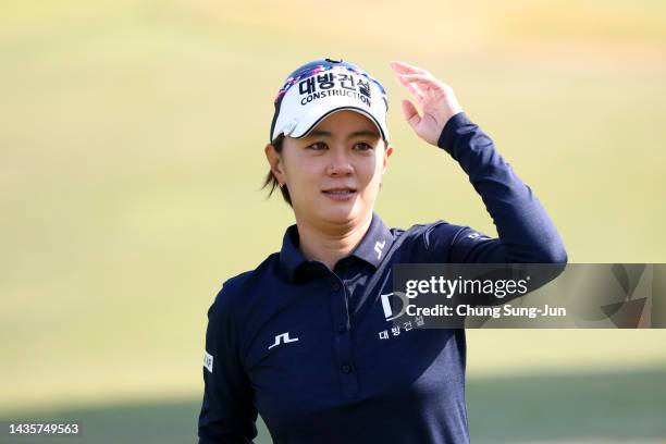 Na-yeon Choi of South Korea acknowledges the gallery after holing out on the 9th green as she is retiring from LPGA tournaments during the final...