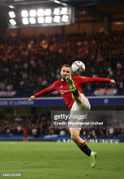 Luke Shaw of Manchester United ctbduring the Premier League match between Chelsea FC and Manchester United at Stamford Bridge on October 22, 2022 in...