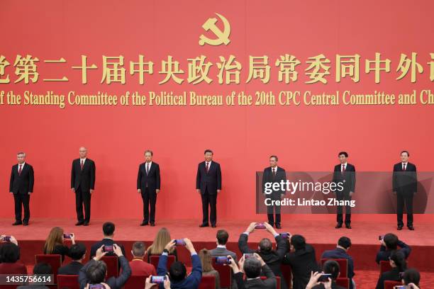 Li Xi, Cai Qi, Zhao Leji, Xi Jinping ,Li Qiang, Wang Huning and Ding Xuexiang attend the meeting between members of the standing committee of the...