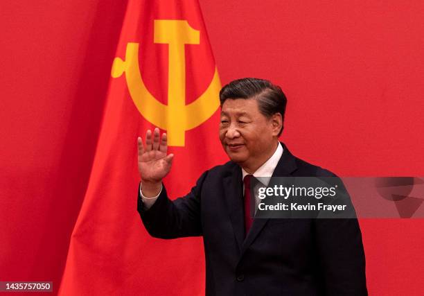 General Secretary and Chinese President Xi Jinping waves as he arrives for a press event with Members of the new Standing Committee of the Political...