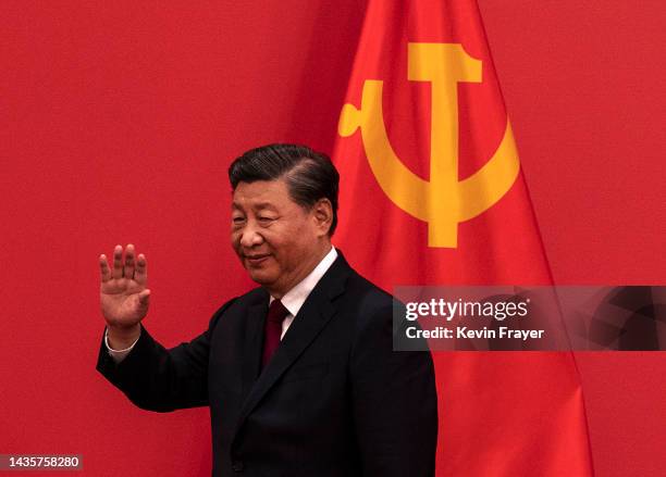 General Secretary and Chinese President Xi Jinping waves as he arrives for a press event with Members of the new Standing Committee of the Political...