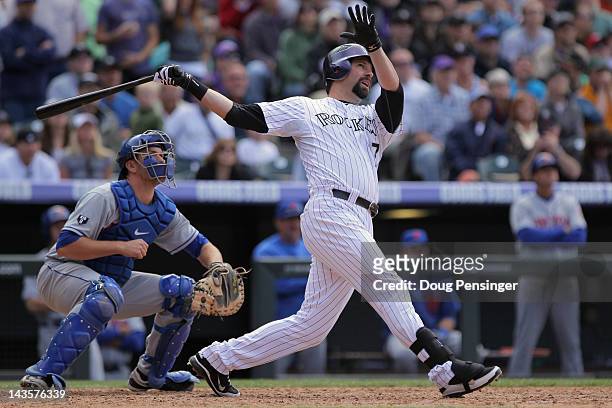 Todd Helton of the Colorado Rockies hits a pinch hit grand slam homer run off of relief pitcher Tim Byrdak of the New York Mets to tie the score 4-4...