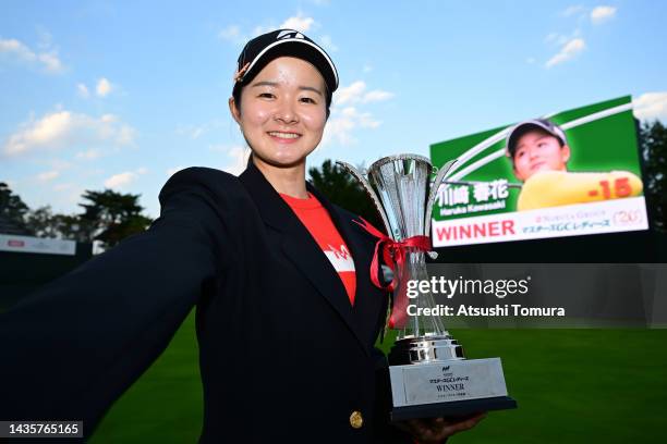 Haruka Kawasaki of Japan imitates a selfie after winning the tournament following the final round of the Nobuta Group Masters GC Ladies at Masters...