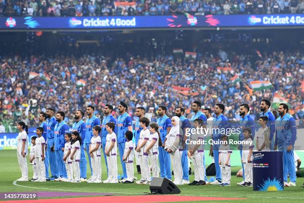 India stand for the national anthem during the ICC Men's T20 World Cup match between India and Pakistan at Melbourne Cricket Ground on October 23,...