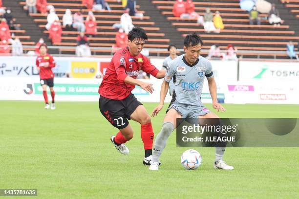 And battle for the ball during the J.LEAGUE Meiji Yasuda J2 42nd Sec. Match between Zweigen Kanazawa and Tochigi SC at Ishikawa Athletics Stadium on...