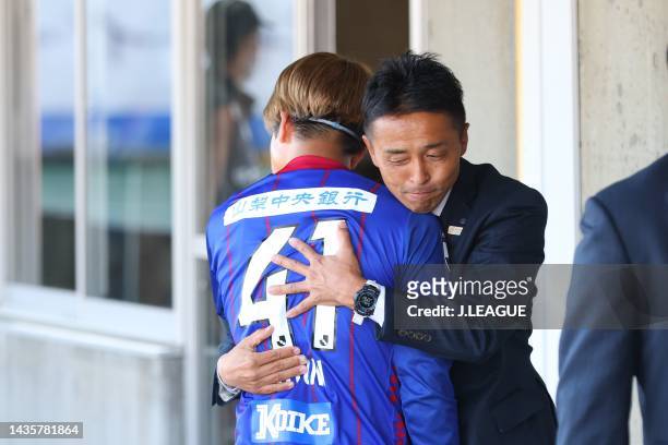 Motoki HASEGAWA and Head coach Tatsuma YOSHIDA of Ventforet Kofu hug prior to the J.LEAGUE Meiji Yasuda J2 42nd Sec. Match between Ventforet Kofu and...