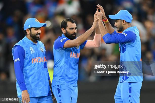 Mohammed Shami of India celebrates getting the wicket of Iftikhar Ahmed of Pakistan during the ICC Men's T20 World Cup match between India and...