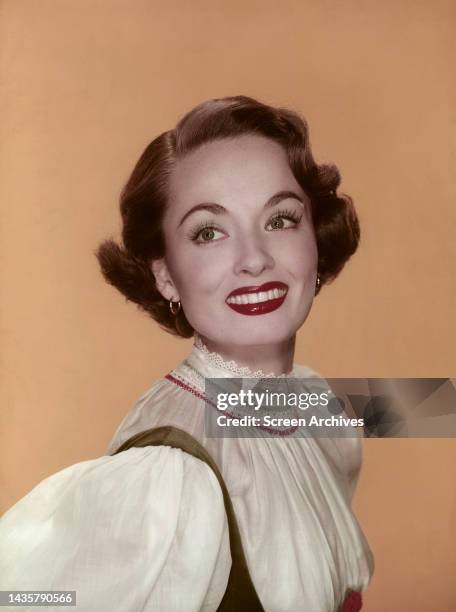 Ann Blyth vintage color studio smiling portrait circa 1953 .