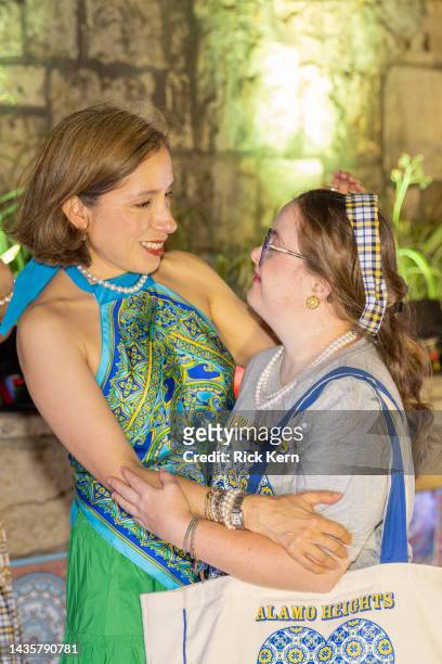 Designer Marisol Deluna and a student participant attend the Marisol Deluna Foundation Presents: An Evening of Fashion at the Arneson River Theater...