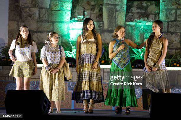 Designer Marisol Deluna and student participants attend the Marisol Deluna Foundation Presents: An Evening of Fashion at the Arneson River Theater on...