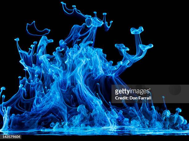 glowing blue liquid - blue smoke stock pictures, royalty-free photos & images
