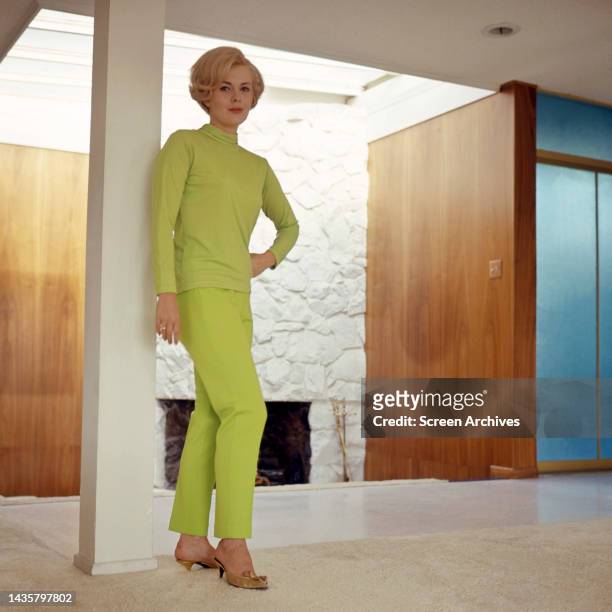 Jean Seberg striking elegant glamour pose in green outfit circa 1964.