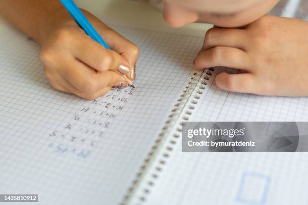 Kid Writing Down Math Math 752 Math Workbook Stock Photos, High-Res Pictures, and Images - Getty ...