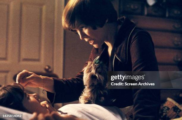 The Exorcist Ellen Burstyn tends to Linda Blair in bed in a scene from the 1973 William Friedkin movie.