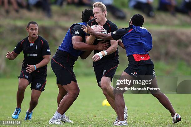 Micheal Luck runs through drills during a New Zealand Warriors NRL training session at Otahuhu College on April 30, 2012 in Auckland, New Zealand.