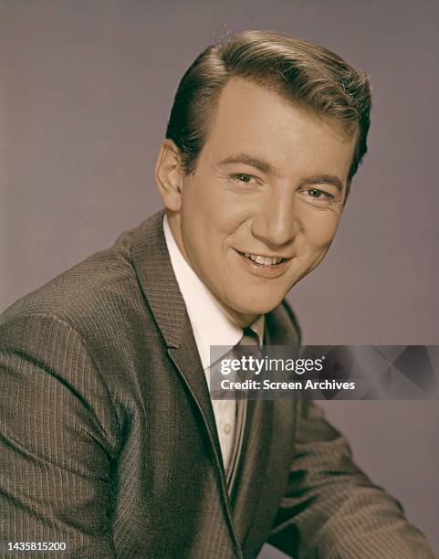 Bobby Darin American actor, singer and composer smiling studio publicity portrait circa 1961.