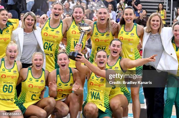 Liz Watson of Australia holds up the Constellation Cup as the Australian team celebrates victory after the Constellation Cup match between the...