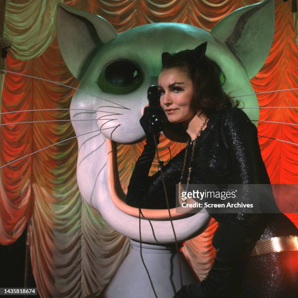 Julie Newmar as Catwoman talking on telephone from the 1960's classic TV series Batman.