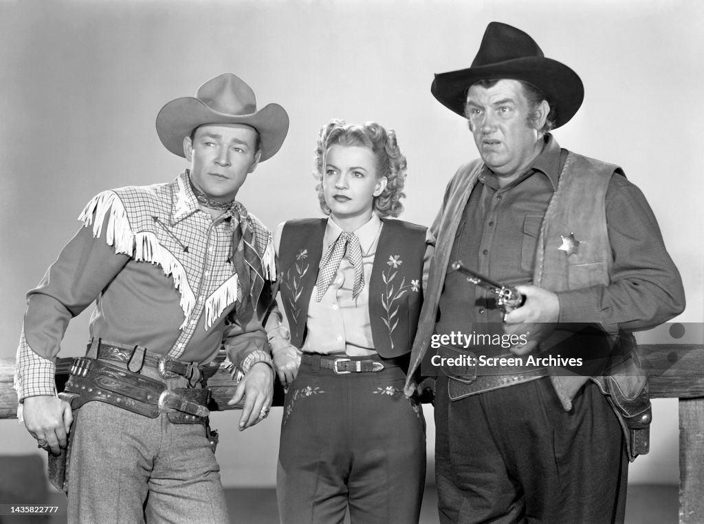 Roy Devine Roy Rogers, Dale Evans and Andy Devine pose for a publicity photo for ...
