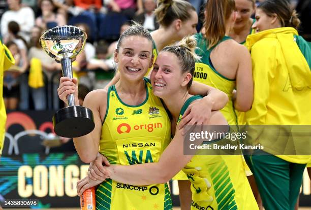 Jamie-Lee Price and Liz Watson of Australia embrace after the Constellation Cup match between the Australia Diamonds and New Zealand Silver Ferns at...