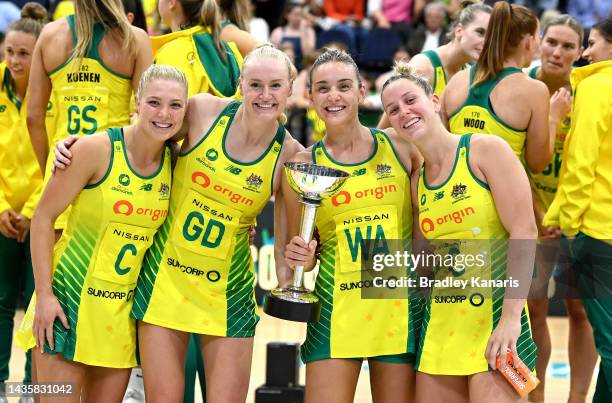Courtney Bruce, Jo Weston, Liz Watson, and Jamie-Lee Price of Australia pose for a photo with the Constellation Cup as they celebrate victory after...