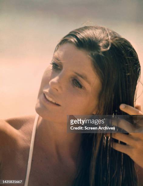 Katharine Ross posing with wet hair for a 1960's publicity portrait.