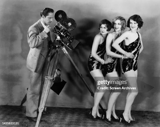 Frederic March photographing Clara Bow's Wild Party Flapper Girls 1929.
