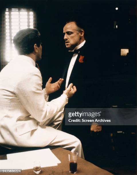 The Godfather Al Martino as Johnny Fontaine asks Marlon Brando's Don Vito Corleone for a favor in a scene from the classic 1972 Francis Ford Coppola...