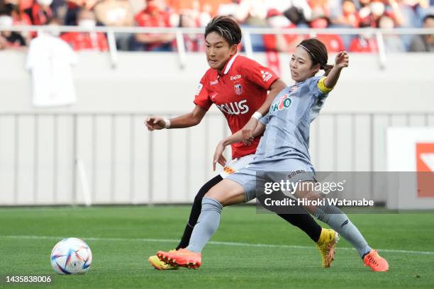 Yuika Sugasawa of MHI Urawa Reds Ladies and Moe Kimotsuki of AC Nagano Parceiro compete for the ball during the WE League match between Mitsubishi...