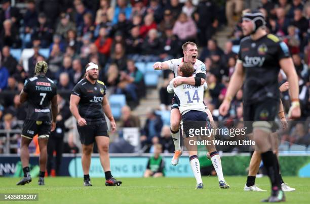 Nick Tompkins and Max Malins of Saracens celebrate winning the Gallagher Premiership Rugby match between Exeter Chiefs and Saracens at Sandy Park on...