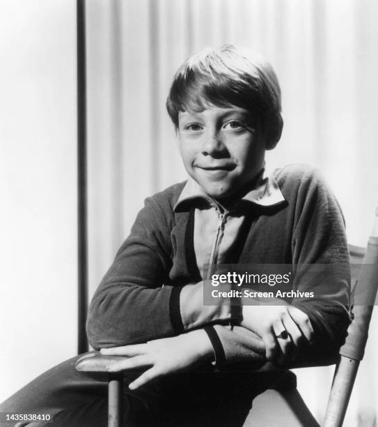 Lost in Space Billy Mumy posing in directors chair for his role as Will Robinson from the classic 1960's TV sci-fi series.