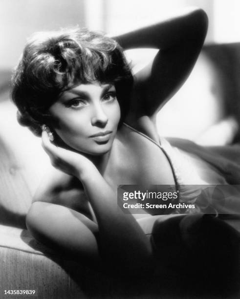 Gina Lollobrigida posing for a publicity portrait for the 1965 movie Lady L , Gina did not complete the movie, the role was eventually taken by...